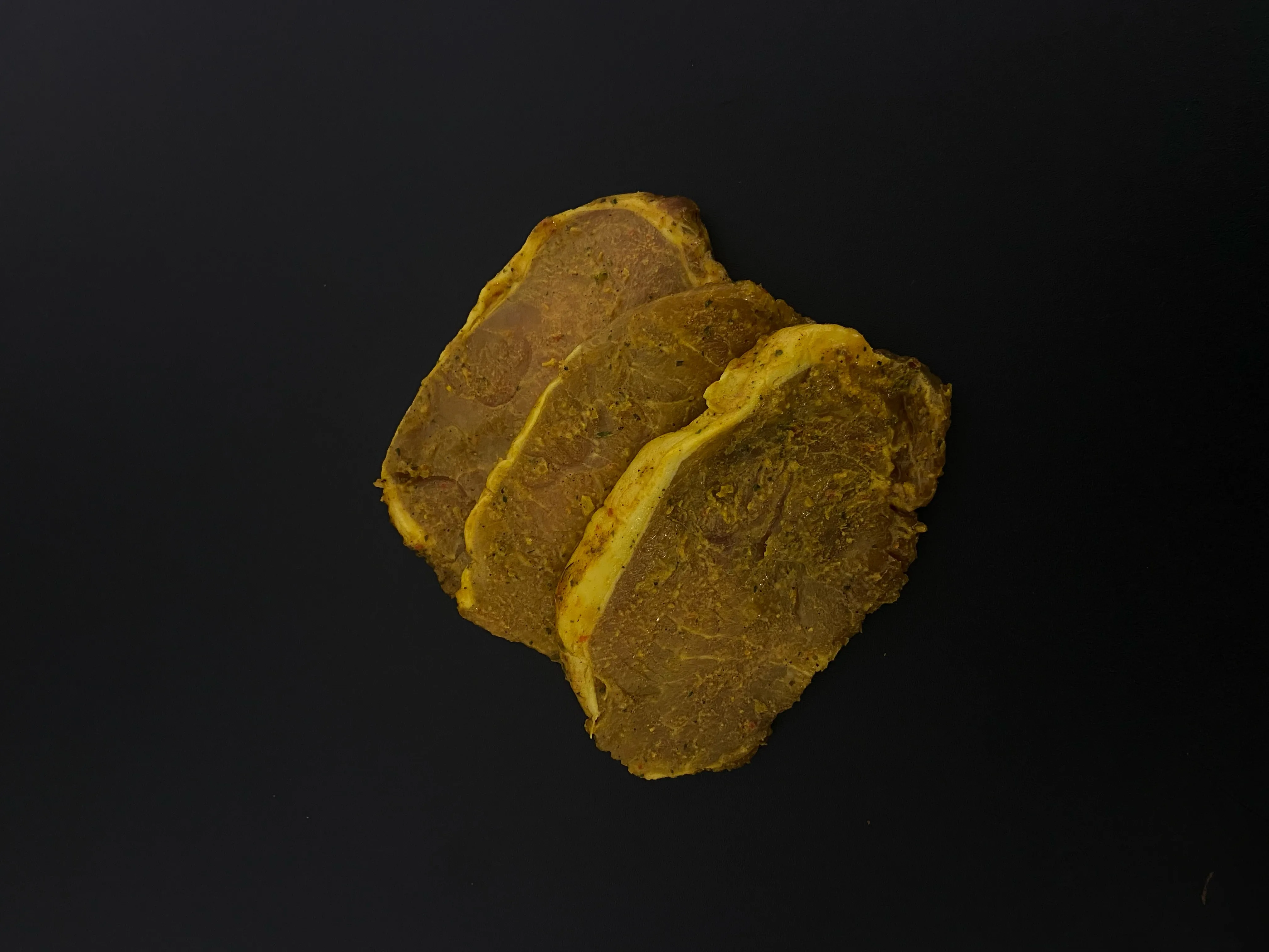 Lomo de porc mariné au curry